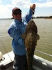 Moreton Bay Charters Skipper with large Flathead